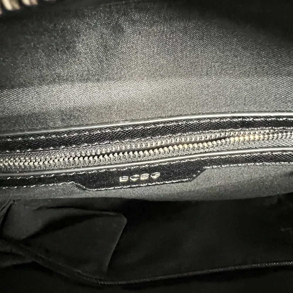 RICARDO Beverly Hills Tan and Black Travel Bag with Structured Shape
